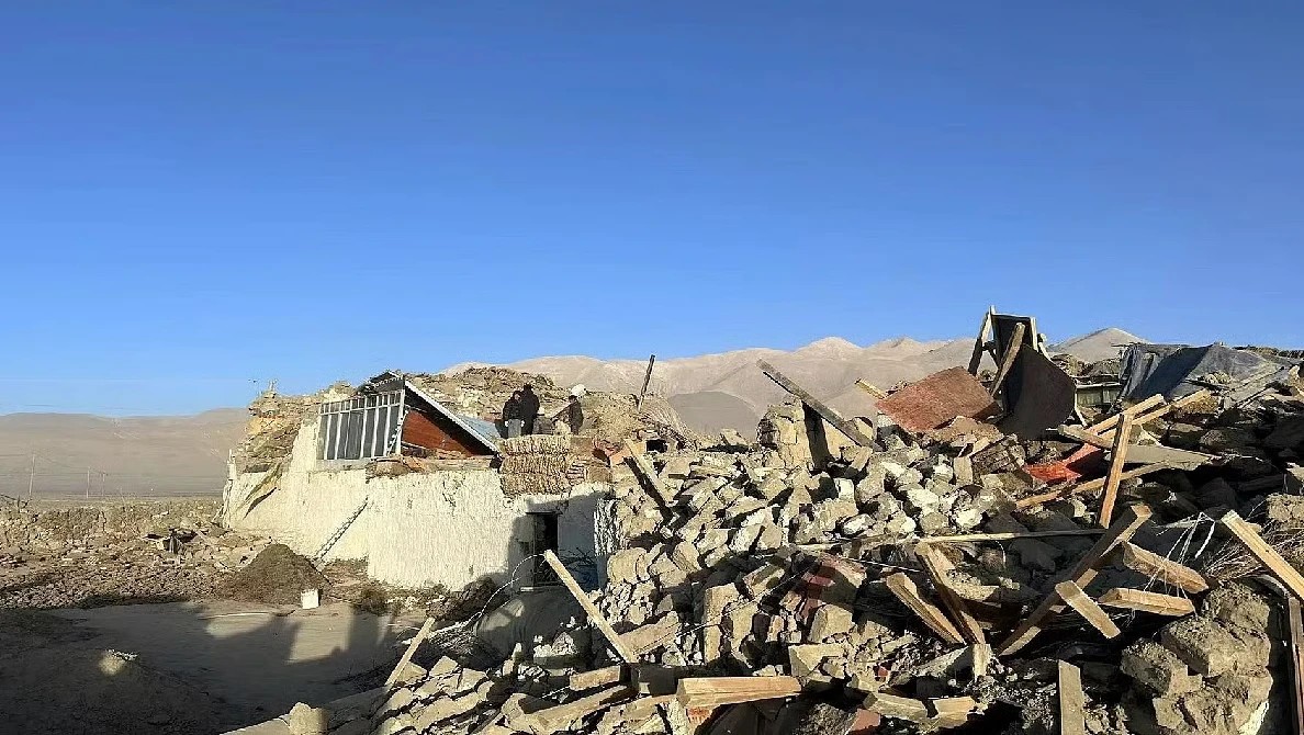 Collapsed stone houses in a mountain village on the Tibetan plateau after an earthquake