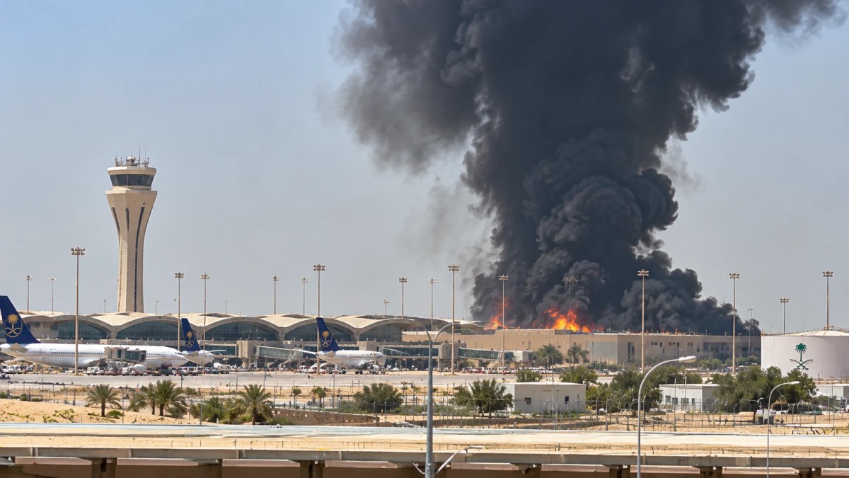 Illustration of smoke rising behind an airport terminal and control tower