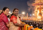 Illustration of two women watching a giant Ravana effigy burn at a Dussehra ground at night