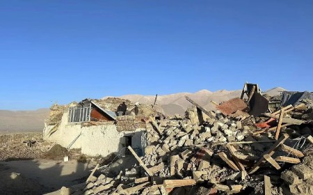 Collapsed stone houses in a mountain village on the Tibetan plateau after an earthquake