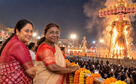 Illustration of two women watching a giant Ravana effigy burn at a Dussehra ground at night